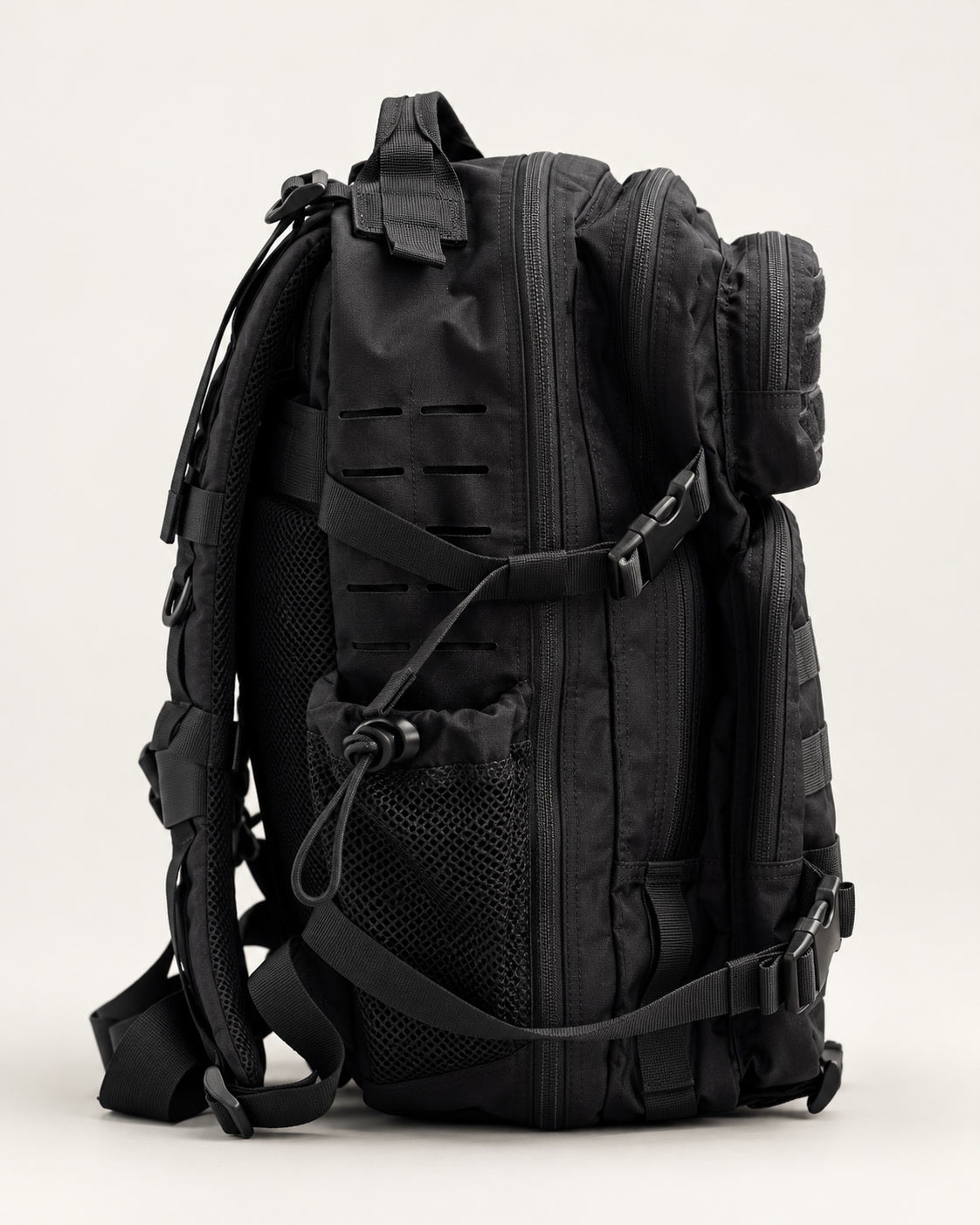 ATLAS 25L backpack, side profile with laser-cut MOLLE and bottle pocket